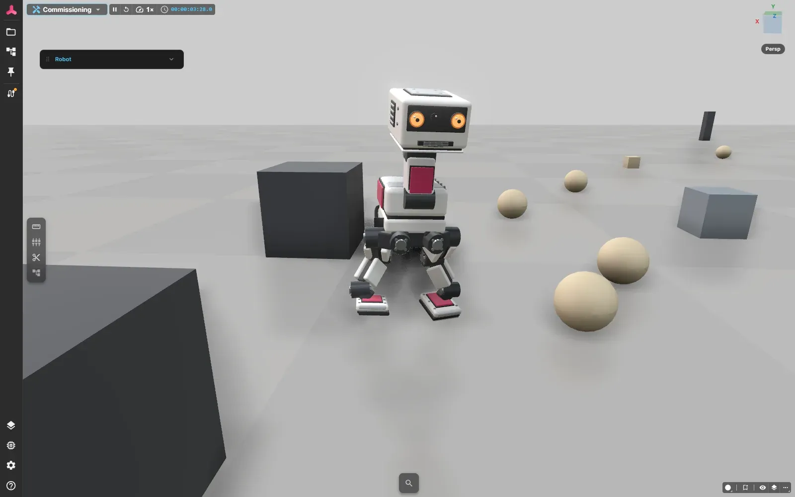 The two-legged walking robot mid-stride, close up, between sand-coloured balls and grey cubes